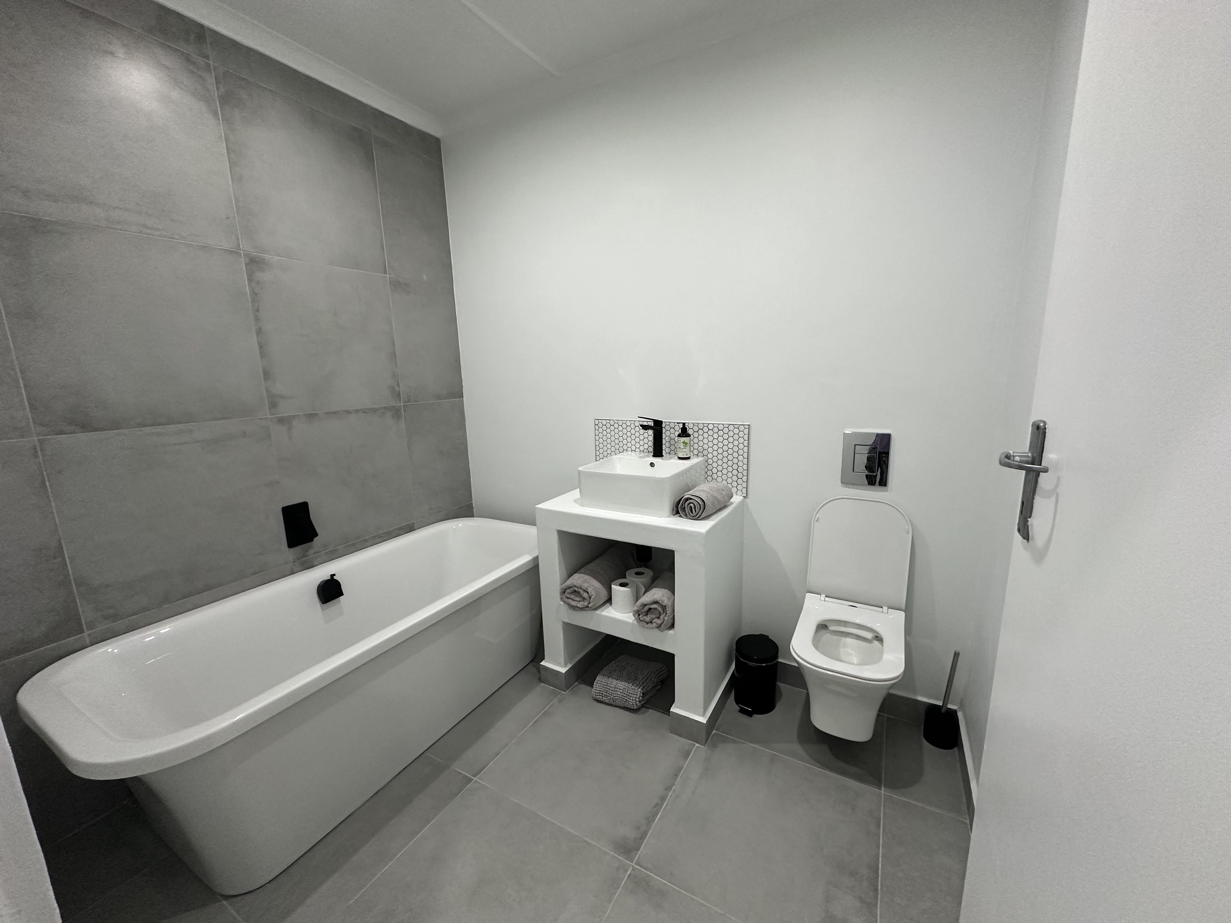 Middle Bathroom with Bath